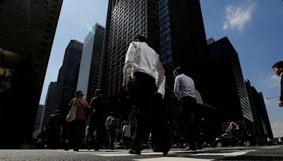 Japan firms business mood slips as weak yen squeezes households