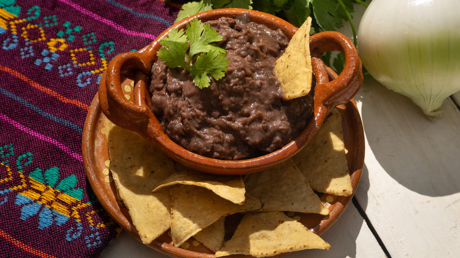 The Aromatic Ingredient You Need To Improve Canned Refried Beans