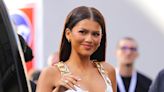 Zendaya Is a Goddess in Gold Chain-Adorned Zipper Dress at Louis Vuitton Show