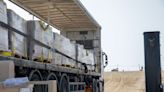 Aid offloaded from Gaza pier as Israel again denies genocide allegations