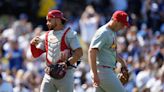 Shohei Ohtani reaches 3 times in home debut as the Dodgers rout the Cardinals 7-1