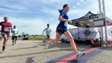 Hundreds take off on foot at Ford Airport for 5K