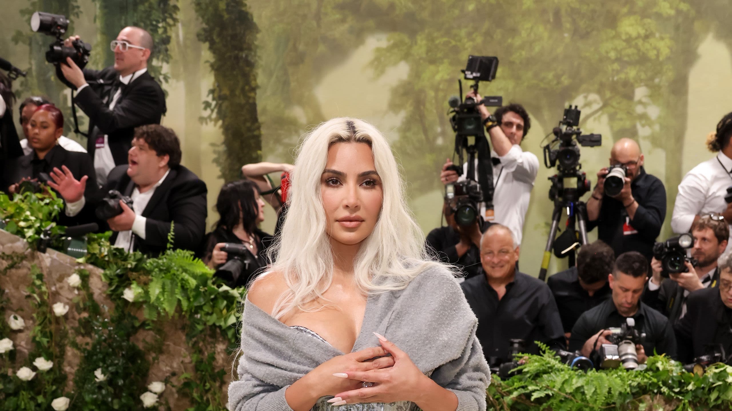 Kim Kardashian Shines in a Silver Floral Corset Gown at the 2024 Met Gala