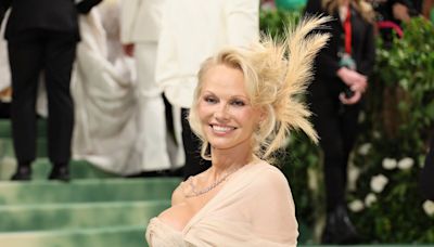 Pamela Anderson runs through New York City park in gown after Met Gala