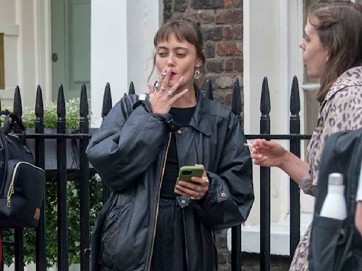 Fallout star Ella Purnell puffs away on a cigarette