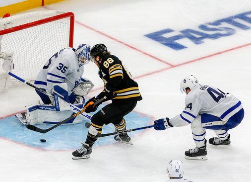 David Pastrnak heeds the call, scores Game 7 OT winner to propel Bruins into second round - The Boston Globe