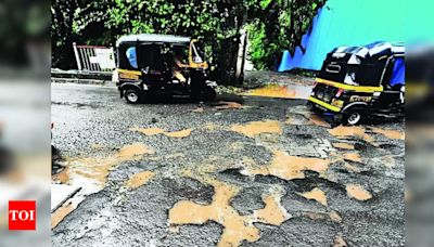 BMC to issue show-cause notices to sub-engineers for potholes in Mumbai | Mumbai News - Times of India