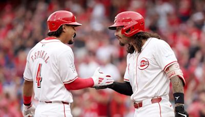 Santiago Espinal homers to extend hit streak to 10 games, Reds' bullpen holds on to beat Cubs 6-3