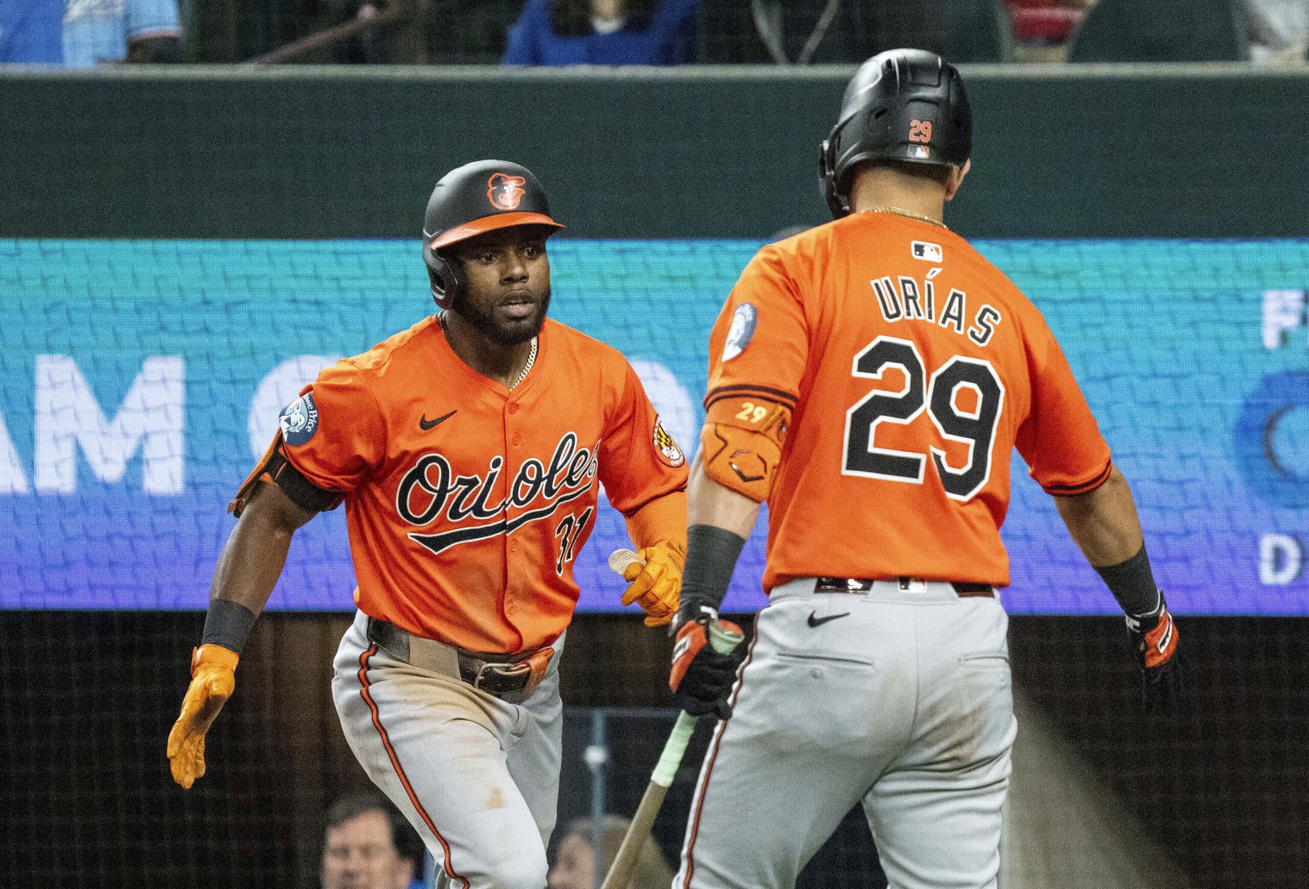 Grayson Rodriguez gets AL-best 12th win as Orioles hit 3 more homers to beat Rangers 8-4 - WTOP News