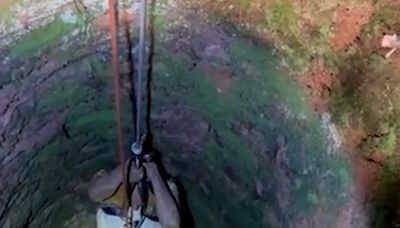Watch as rescuers save Georgia man who fell down 50-foot well while looking for phone