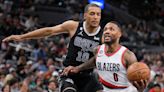 Lillard guía a los Blazers para vencer 128-112