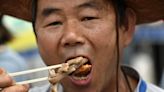 South Korea to ban divisive practice of eating dog meat, ruling party says