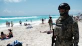 Gunmen open fired at rival drug dealers at a Cancun beach. A 12-year-old boy was left dead