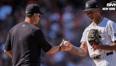 Aaron Boone, Luis Gil and Aaron Judge following Yankees 17-5 loss vs. Orioles