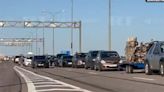 Consequences of attack on Crimean Bridge: Queues towards bridge and ferry crossing, traffic jams in Kherson Oblast