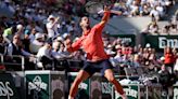 Novak Djokovic has a challenging day but reaches French Open fourth round again