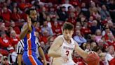 Tyler Wahl and Carter Gilmore cherish their visit with former Wisconsin basketball player Walt McGrory, who is battling bone cancer