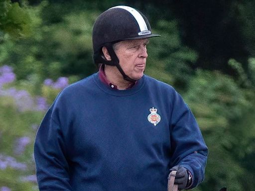 Prince Andrew is seen horse riding around Windsor Castle