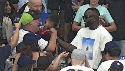 New Mariners OF Arozarena watches from Tropicana Field stands with fans after he's traded by Tampa Bay