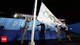 Paris Olympic flag raised upside down in rain-soaked opening ceremony - Times of India