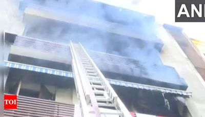 Fire at multi-storey house in southeast Delhi, woman rescued | Delhi News - Times of India