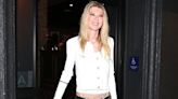 Tara Reid, 48, shows a hint of her slender tummy in a white top in LA