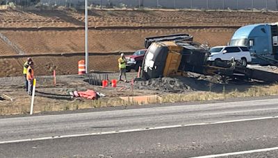 Eastbound I-182 down to two lanes after excavator tips over