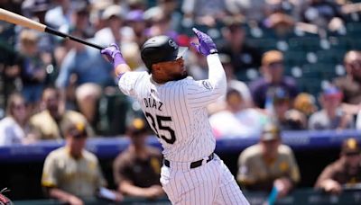 Elias Diaz gets key hit as the Rockies rally for a wild 10-9 victory over the Padres