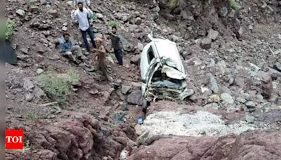 6 injured as car falls into gorge after driver dozes off | India News - Times of India