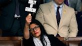 Rep. Rashida Tlaib Protests Netanyahu Speech With 'War Criminal' Sign