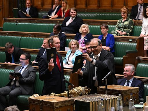 What happens at MPs' swearing in and what is the oath of allegiance?