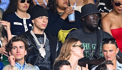 Wimbledon shakes off image as rap stars take Centre Court by storm