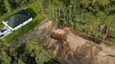 Large hole opens in ground on Brooksville property