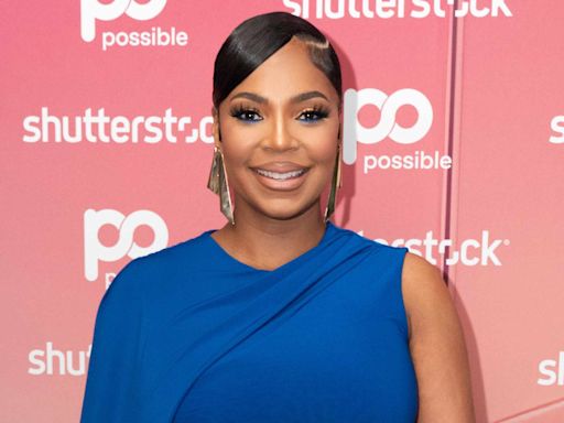 Pregnant Ashanti Shows Off Her 'Sweet Baby' on the Way with Nelly in Curve-Hugging Dress