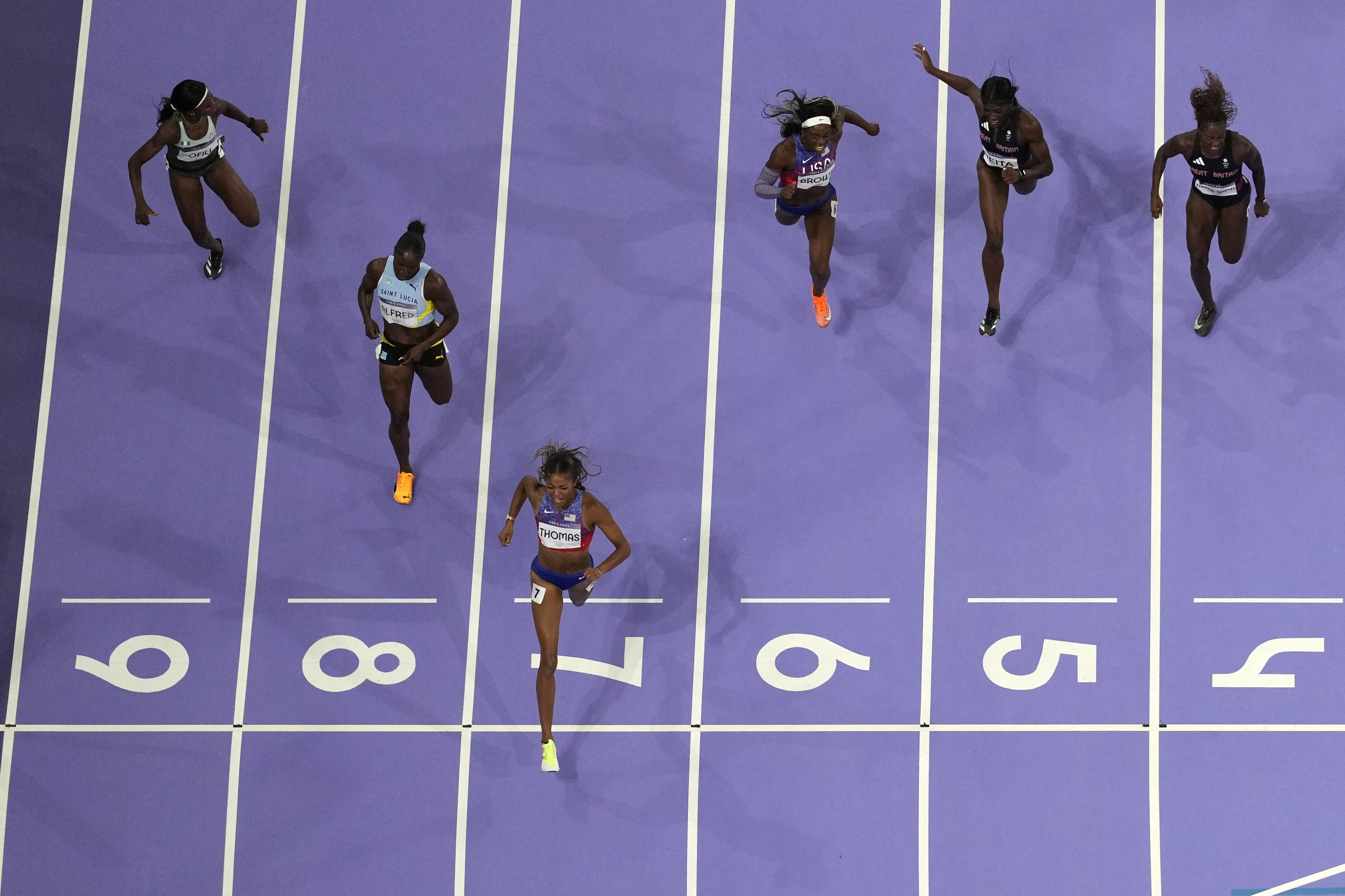 Harvard graduate Gabby Thomas sprints to 200-meter gold medal for the United States by a big margin