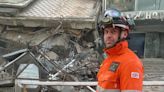 British firefighters film dramatic moment two people rescued from rubble