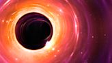 Could a black hole devour the universe?