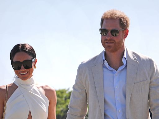 Prince Harry's reaction to Meghan kissing teammate goes viral