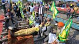 Indian farmers strike to demand guaranteed crop prices as others attempt to march to New Delhi