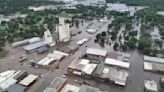 Millions swelter across U.S., while floodwaters inundate Midwest