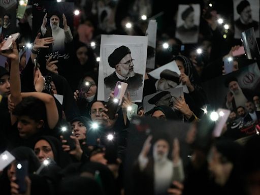 Iranian crowd chants 'death to America' at funeral for dead president