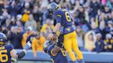 Greene and White's massive days lead WVU to win over Cincinnati