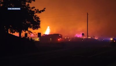 Eyele Fire burning along Hwy 21 threatening homes