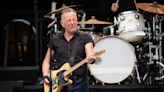 What time is Bruce Springsteen performing on stage at London's Wembley Stadium?