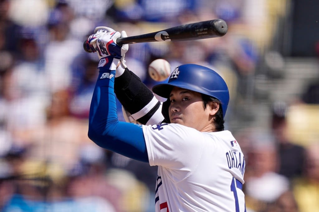 Shohei Ohtani’s first walkoff hit as a Los Angeles Dodger beats the Cincinnati Reds in extra innings