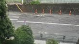 Cars drive on flooded Tokyo road as Typhoon Nanmadol drenches city