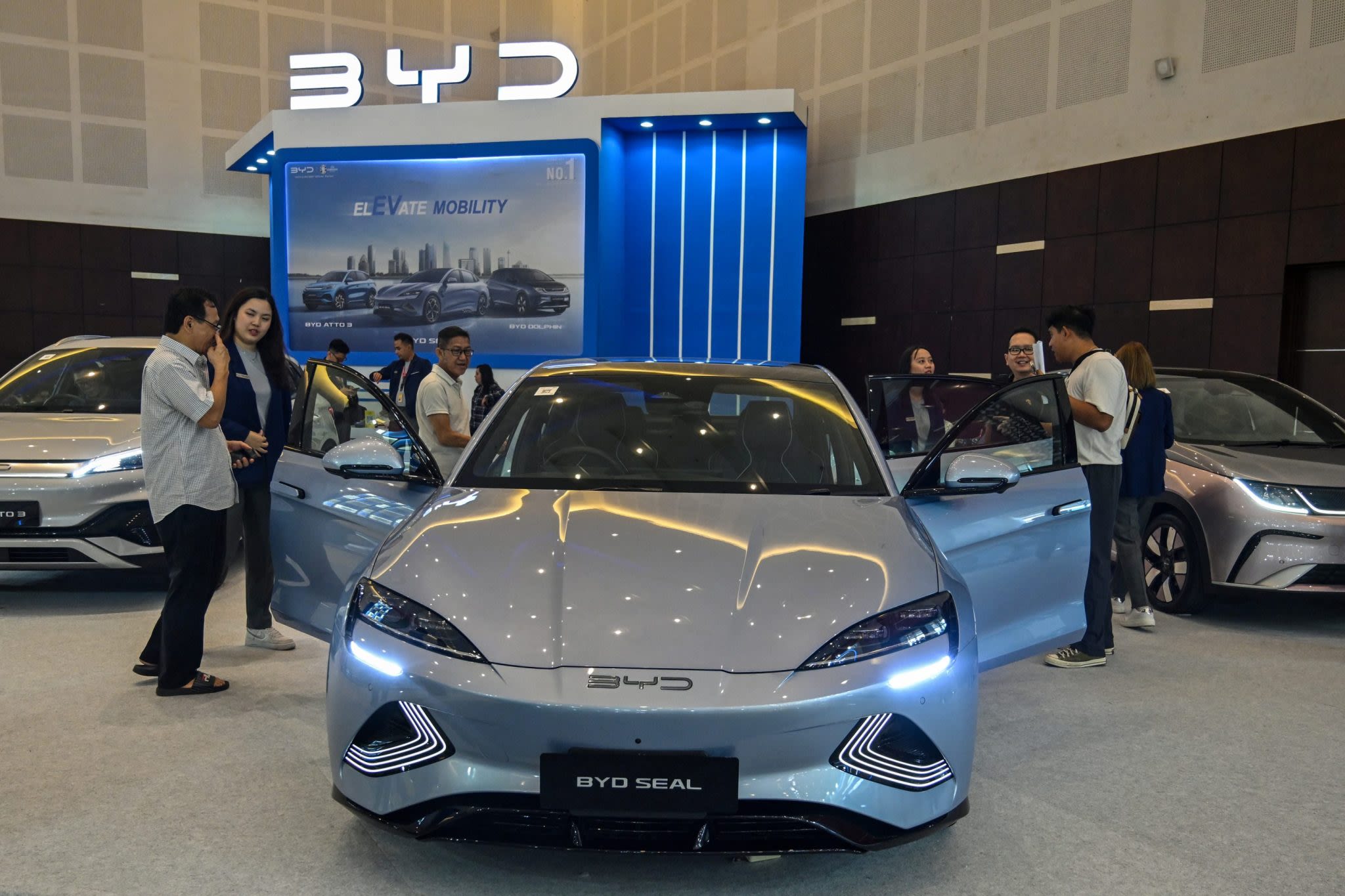 Porsche and Ferrari sales slump in China as car buyers flock to EVs instead