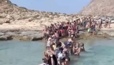 Terrified tourists told to disembark from ferry into the SEA in Greece