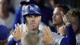 Dodgers' Freddie Freeman scratched, returning to Los Angeles to be with family