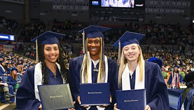 Paige Bueckers, Aaliyah Edwards dance at Gampel Pavilion as the UConn stars take part in graduation
